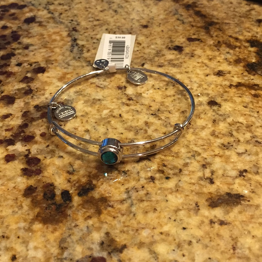 Silver Bloomingdales charm bracelet